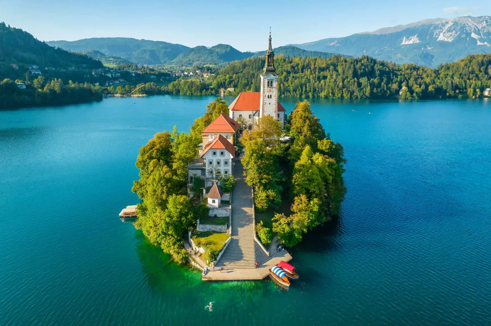Lake Bled island with its church and the Julian Alps behind